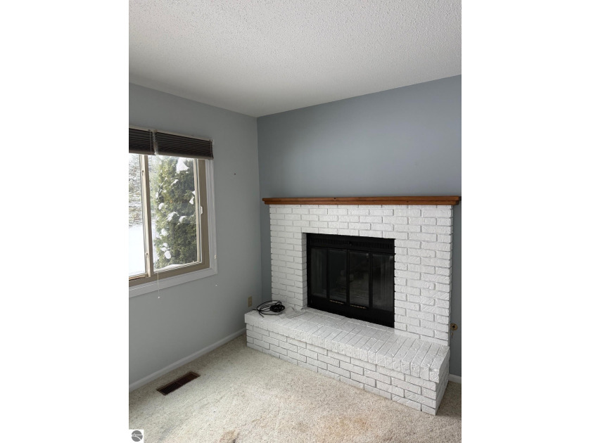 Green Meadows Condominiums ground-floor unit in a rare two-story - Beach Condo for sale in Traverse City, Michigan on Beachhouse.com