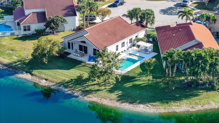 This one-of-a-kind lakefront home has been completely rebuilt - Beach Home for sale in Boca Raton, Florida on Beachhouse.com