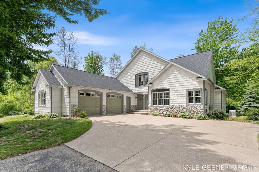 Welcome to an extraordinary private estate nestled on 3.75 - Beach Home for sale in Holland, Michigan on Beachhouse.com