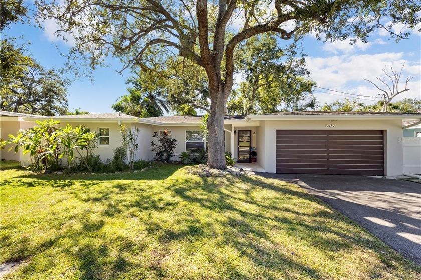 Welcome to this charming 4-bedroom, 2-bath home offering - Beach Home for sale in Largo, Florida on Beachhouse.com