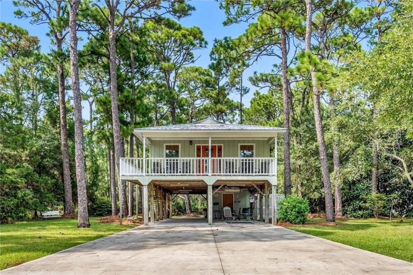 This beautiful Island cottage is a two bedroom, two bath nestled - Beach Home for sale in Dauphin Island, Alabama on Beachhouse.com