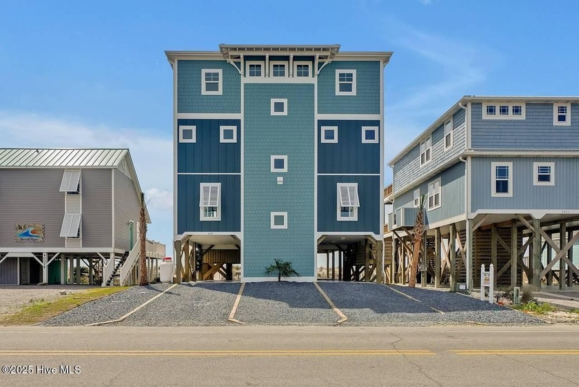 BIG INCOME PRODUCER!!! A perfect oceanfront location within - Beach Home for sale in Oak Island, North Carolina on Beachhouse.com