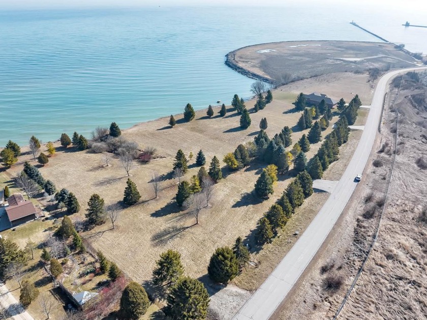 Discover the epitome of waterfront living on this captivating 2 - Beach Acreage for sale in Kewaunee, Wisconsin on Beachhouse.com