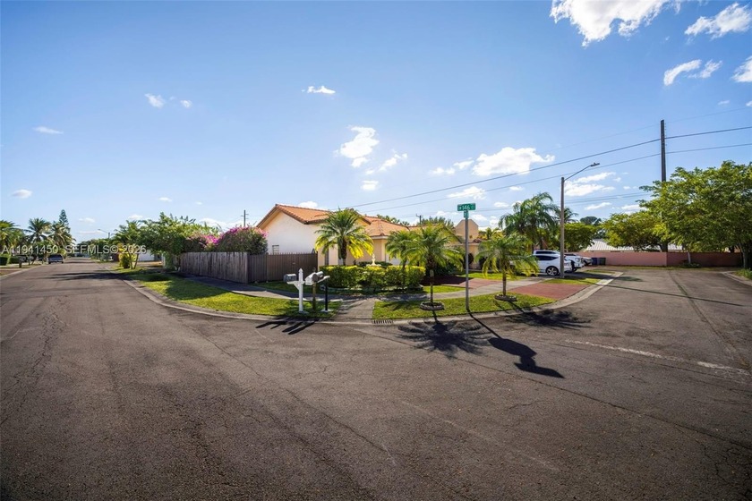 Spectacular corner home located in a highly desirable and - Beach Home for sale in Miami, Florida on Beachhouse.com