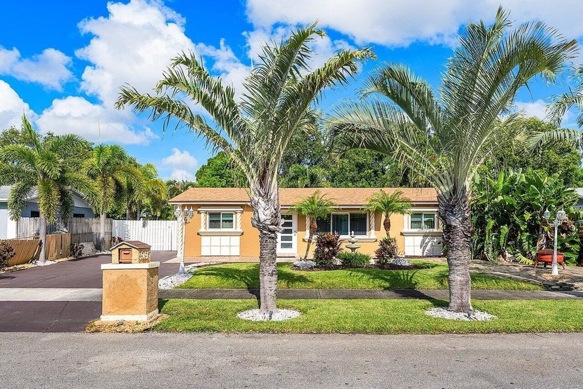 Welcome to this spacious single-family home offering over 1,600 - Beach Home for sale in Deerfield Beach, Florida on Beachhouse.com