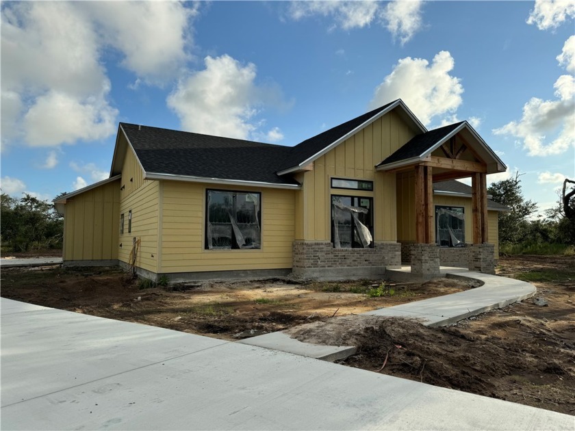 Welcome to your coastal retreat! This modern farmhouse nestled - Beach Home for sale in Rockport, Texas on Beachhouse.com