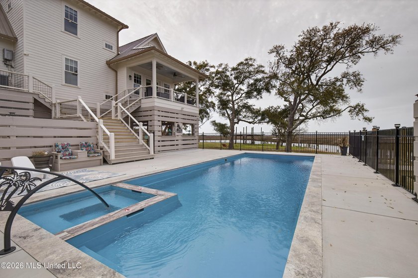 PRICE IMPROVEMENT! Welcome to this stunning custom WATERFRONT - Beach Home for sale in Gautier, Mississippi on Beachhouse.com