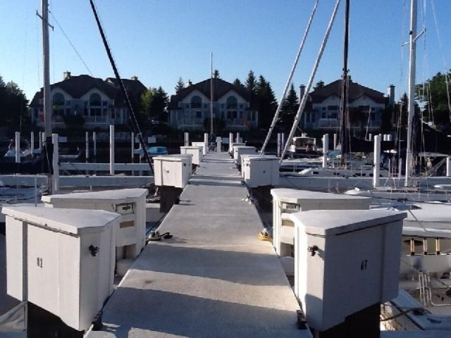 This 35' boat slip at Harbor Village is located in an ideal - Beach Lot for sale in Manistee, Michigan on Beachhouse.com