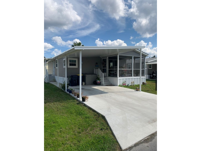 Discover your dream home located in Palm Terrace, a vibrant 55 - Beach Home for sale in Bunnell, Florida on Beachhouse.com