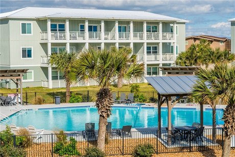 This beautiful 3 bedroom/2 bathroom corner unit at The Pelican - Beach Condo for sale in Port Aransas, Texas on Beachhouse.com