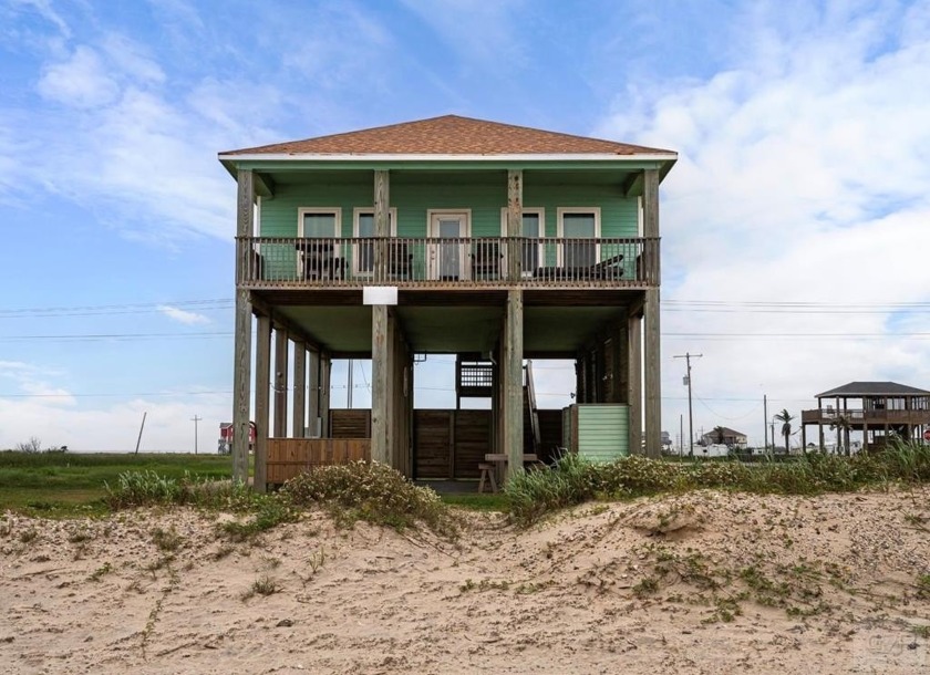 Experience BEACHFRONT living at the delightful *Sea Mist* - Beach Home for sale in Gilchrist, Texas on Beachhouse.com