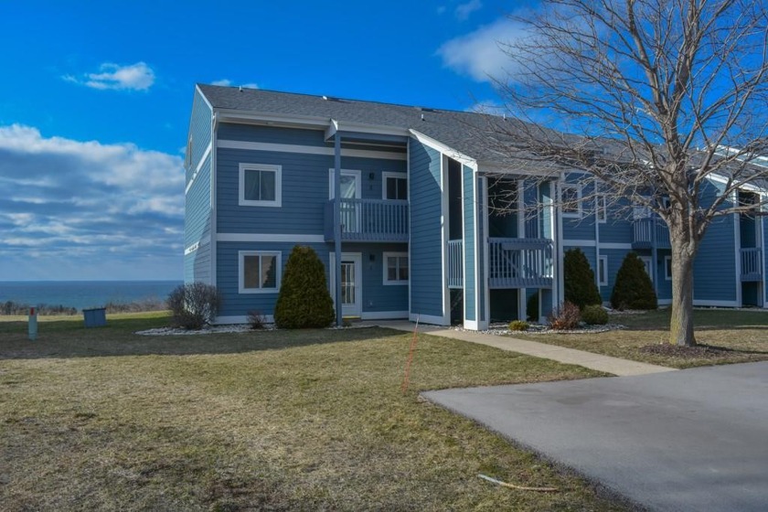 What a view! This well-designed, 2 BR/1.5 BA first-floor unit - Beach Condo for sale in Egg Harbor, Wisconsin on Beachhouse.com