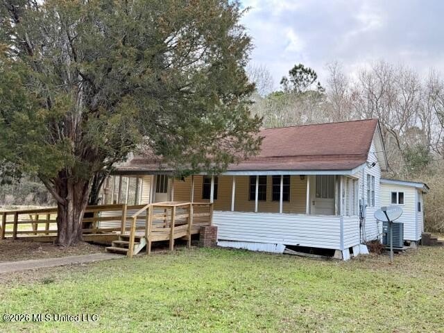 Investor Special! Almost a half of acre lot with an older home - Beach Home for sale in Gautier, Mississippi on Beachhouse.com