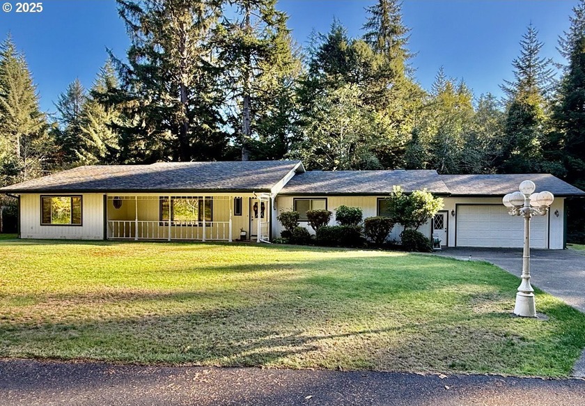 Experience forested tranquility and coastal adventure on this - Beach Home for sale in Florence, Oregon on Beachhouse.com