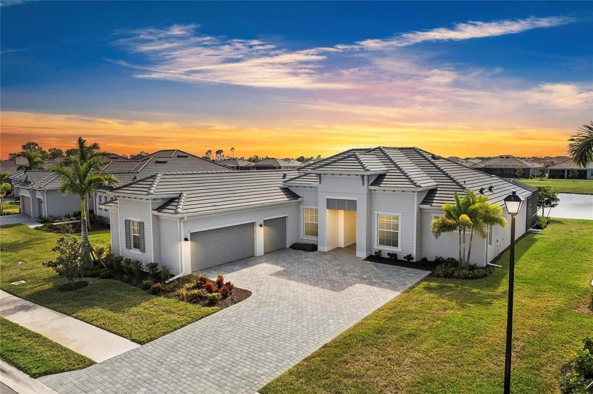 *TURNKEY FURNISHED* This stunning Napoli II model pool home sits - Beach Home for sale in Venice, Florida on Beachhouse.com