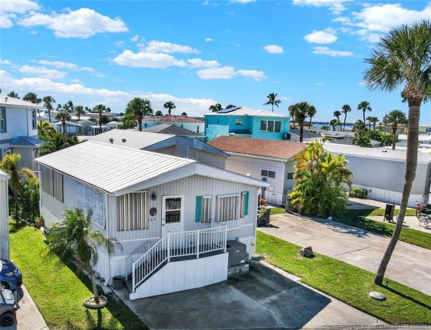 Island living in beautiful Holiday Out! Metal roof. Hurricane - Beach Home for sale in Jensen Beach, Florida on Beachhouse.com