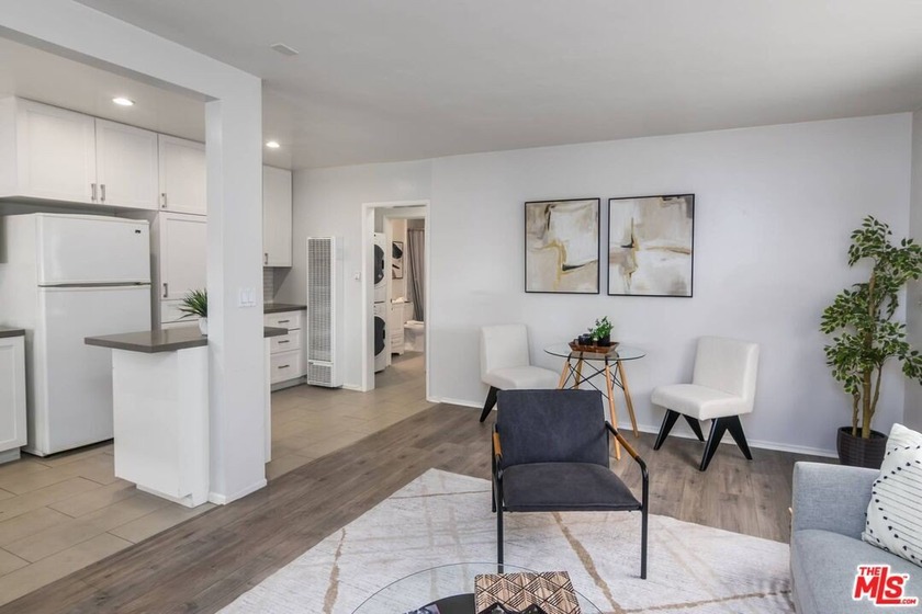Perfectly positioned near UCLA and Santa Monica College, this - Beach Condo for sale in Santa Monica, California on Beachhouse.com