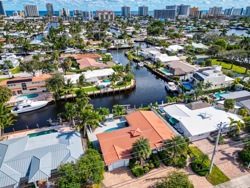 Envision a serene retreat nestled on 80 ft of waterfront with - Beach Home for sale in Pompano Beach, Florida on Beachhouse.com