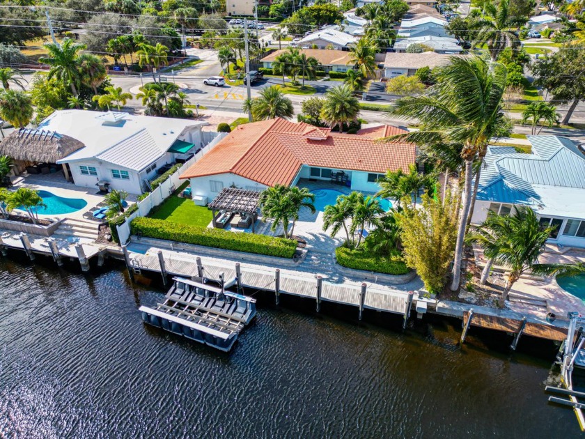 Envision a serene retreat nestled on 80 ft of waterfront with - Beach Home for sale in Pompano Beach, Florida on Beachhouse.com