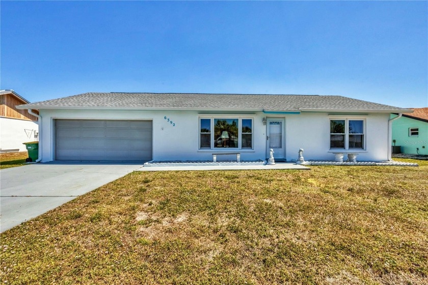 Welcome to this charming, move-in-ready home located in the - Beach Home for sale in Port Charlotte, Florida on Beachhouse.com