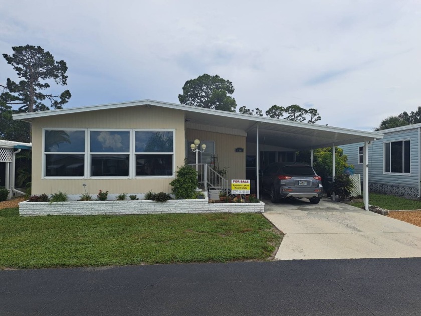 Welcome to 107 Boca Ciega!  This beautiful home is in the dog - Beach Home for sale in Nokomis, Florida on Beachhouse.com