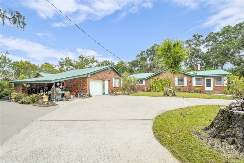 Discover your private slice of coastal paradise with this - Beach Home for sale in Darien, Georgia on Beachhouse.com
