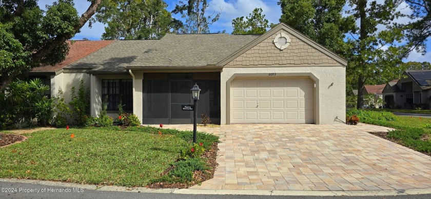 This charming Timber Pines Home is located in Manor Place - Beach Home for sale in Spring Hill, Florida on Beachhouse.com