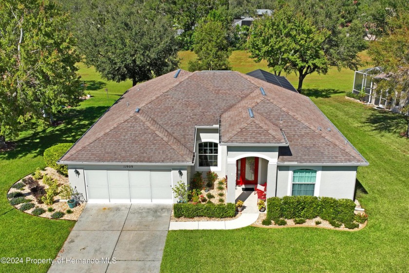 A large foyer welcomes you into this spacious pool home located - Beach Home for sale in Spring Hill, Florida on Beachhouse.com