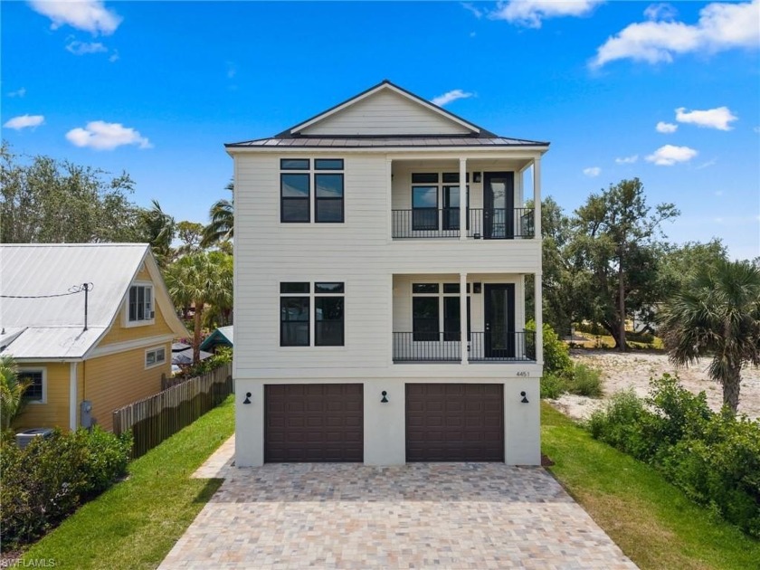 Minutes to Barefoot and Bonita Beach, this brand-new coastal - Beach Home for sale in Bonita Springs, Florida on Beachhouse.com