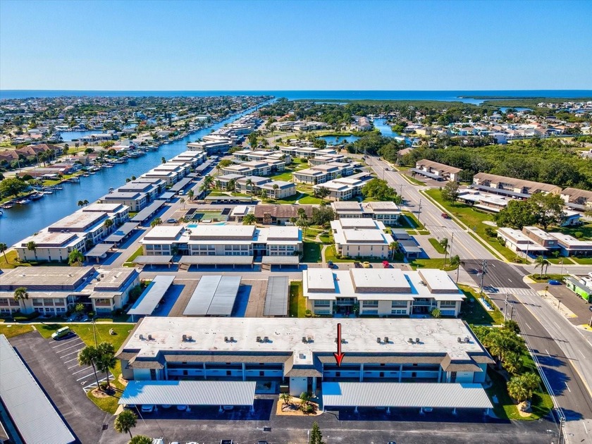 Welcome to Waterfront Living at Windward Cove! Step into this - Beach Condo for sale in New Port Richey, Florida on Beachhouse.com