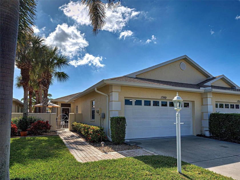 Lovely 2-bedroom, 2-bathroom villa overlooking a serene pond in - Beach Home for sale in Venice, Florida on Beachhouse.com