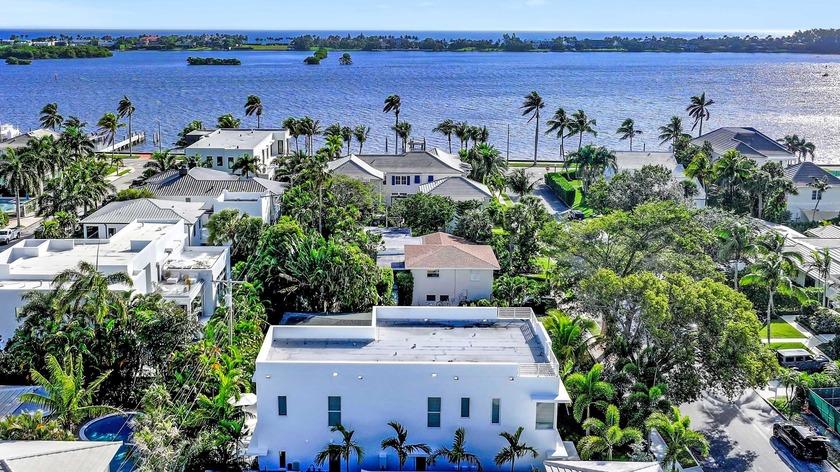 BRAND NEW 2024 CONSTRUCTION ON THE INTRACOASTAL BLOCK! This - Beach Home for sale in West Palm Beach, Florida on Beachhouse.com