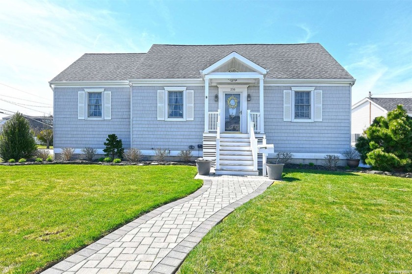 Stunning Dormered Expanded Cape On Huge Landscaped Property In - Beach Home for sale in Amityville, New York on Beachhouse.com