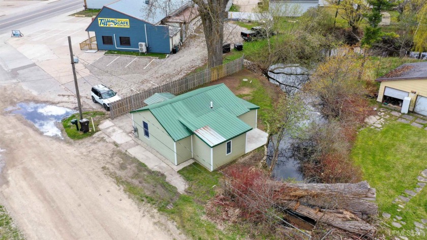 Located in the heart of Manistique, you'll find this incredibly - Beach Home for sale in Manistique, Michigan on Beachhouse.com