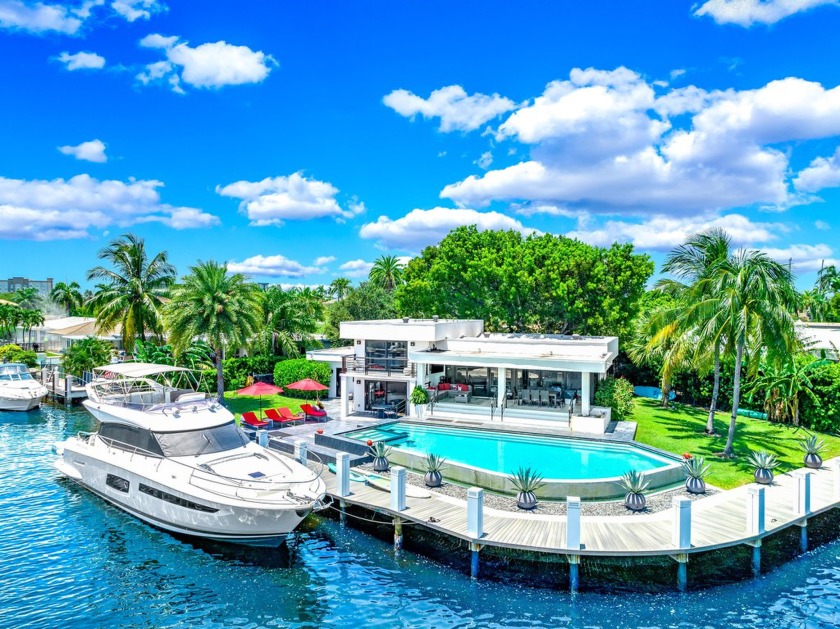 Nestled on a quiet cul-de-sac with every neighbor on the water - Beach Home for sale in Pompano Beach, Florida on Beachhouse.com