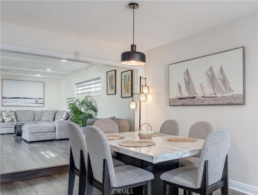 This exquisite 4-bedroom, 2-bath home is located in the Pacific - Beach Home for sale in Huntington Beach, California on Beachhouse.com