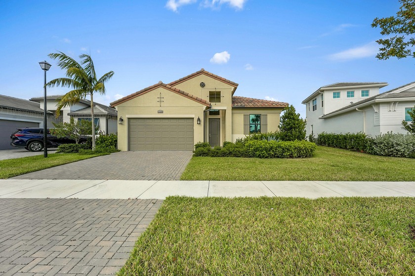 This 2024 CBS home in PGA Verano offers a split floor plan - Beach Home for sale in Port Saint Lucie, Florida on Beachhouse.com