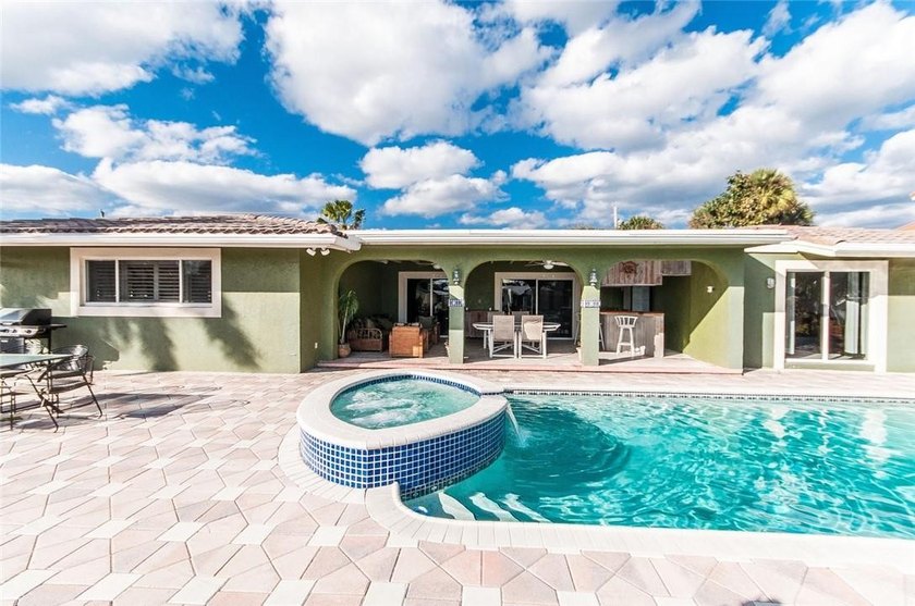This waterfront pool home with 2 car garage is ready for updates - Beach Home for sale in Pompano Beach, Florida on Beachhouse.com