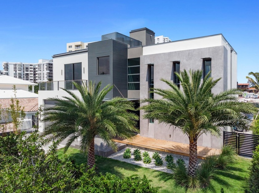 Discover refined living in this stunning modern 5-bedroom, 4 - Beach Home for sale in Lauderdale By The Sea, Florida on Beachhouse.com