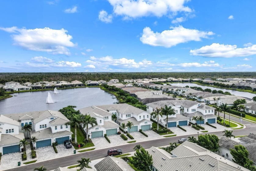 Elegant 2nd floor Coach Home with Lake and Fountain Views! This - Beach Condo for sale in Naples, Florida on Beachhouse.com