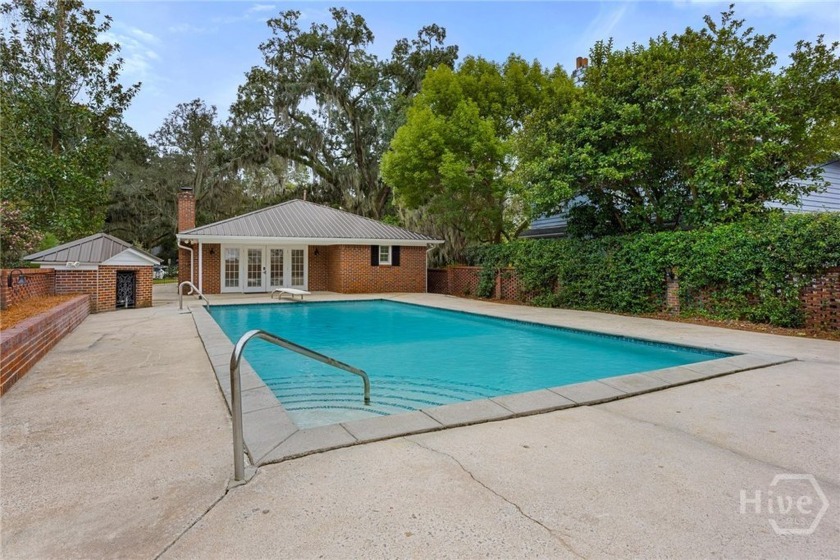 This charming all-BRICK 2-bedroom 2-bath bungalow is tucked in - Beach Home for sale in Savannah, Georgia on Beachhouse.com