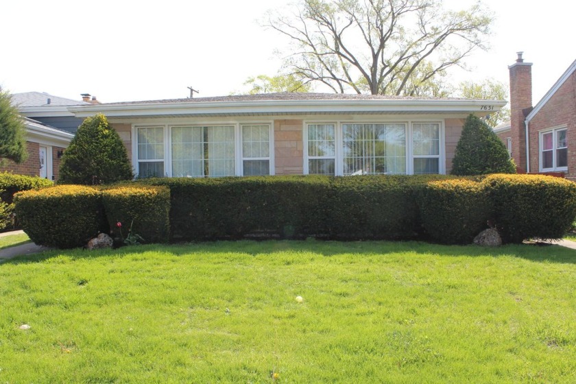 Welcome to this bright and inviting brick home featuring a - Beach Home for sale in Skokie, Illinois on Beachhouse.com