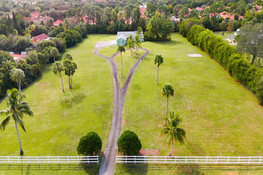 The home is situated on 4.63 Acres, the largest residential lot - Beach Home for sale in Palm Beach Gardens, Florida on Beachhouse.com