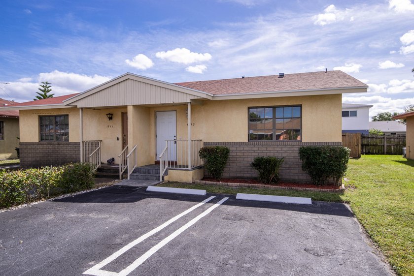 Cozy, updated, and move-in ready duplex in the heart of Lake - Beach Home for sale in Lake Worth Beach, Florida on Beachhouse.com