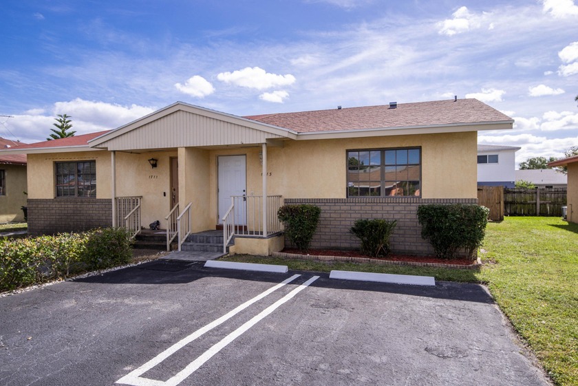 Cozy, updated, and move-in ready duplex in the heart of Lake - Beach Home for sale in Lake Worth Beach, Florida on Beachhouse.com