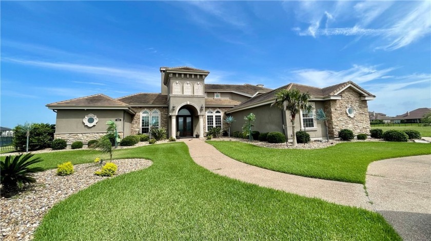 This 4,000+ SQFT ENTERTAINER'S WATERFRONT OASIS 0n .5+ acre - Beach Home for sale in Corpus Christi, Texas on Beachhouse.com