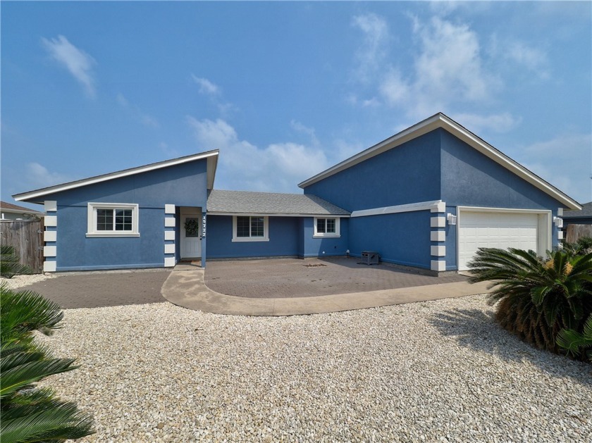 Step into paradise with this newly updated waterfront home on - Beach Home for sale in Corpus Christi, Texas on Beachhouse.com