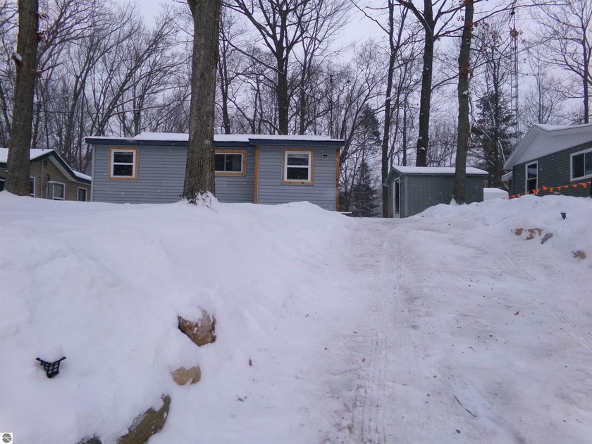 Up north getaway at Bertha Lake! This cabin can be your home - Beach Home for sale in Harrison, Michigan on Beachhouse.com