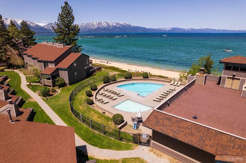 This stunning 4-bedroom, 3-bath townhouse with a spacious loft - Beach Condo for sale in South Lake Tahoe, California on Beachhouse.com