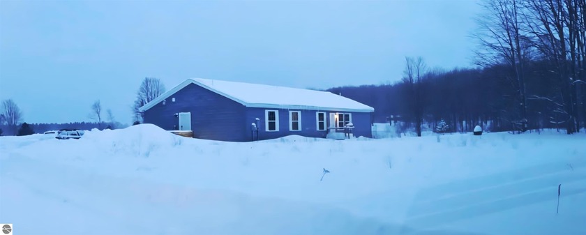 Welcome to your dream home! This stylish and spacious 4-bedroom - Beach Home for sale in Alden, Michigan on Beachhouse.com